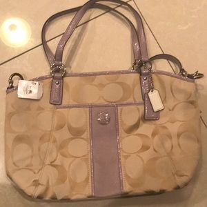 Coach purse has to different handles never used!